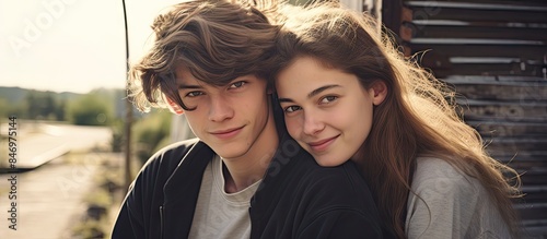 Teenage couple smiling and ...