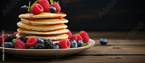 Delicious pancakes topped w...