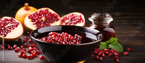 Ripe pomegranate in a bowl ...