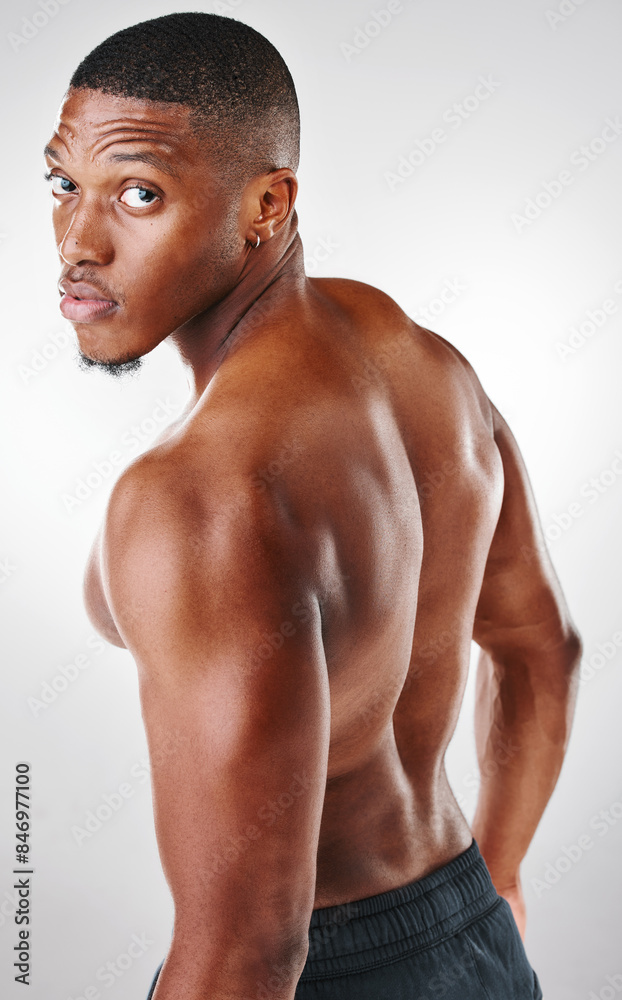 Portrait, African man and back in studio for fitness, workout and results for muscles. Male athlete or bodybuilder, wellness and arms or biceps by white background for sportsman, training and pride Portrait, African man and back in studio for fitness, workout and results for muscles. Male athlete or bodybuilder, wellness and arms or biceps by white background for sportsman, training and pride