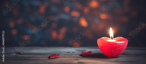 A small red heart-shaped ca...