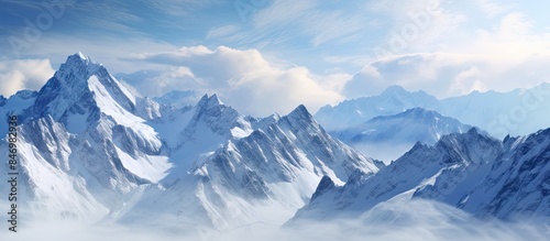 Snow-covered cliffs and tow...