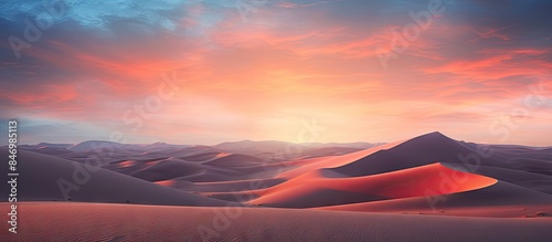 The sun sets over a vast de...