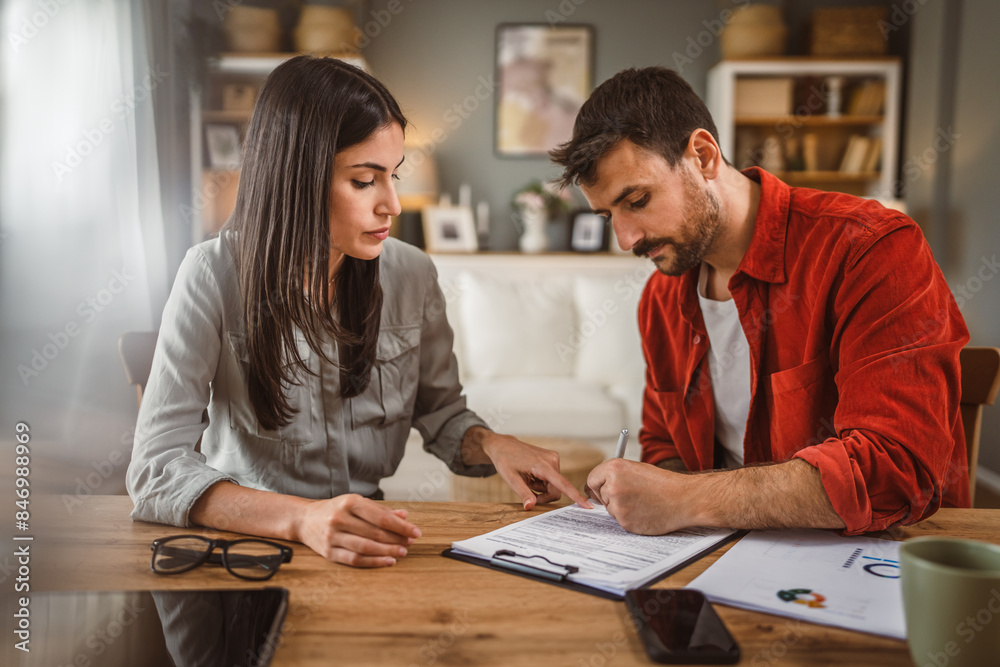 woman financial adviser explain the insurance policy to the men client woman financial adviser explain the insurance policy to the men client