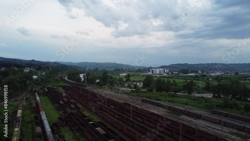 Drone shot of train station and freight yard of Doboj, Bosnia photo