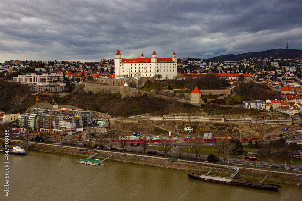 Obraz premium View from the observation deck of the Ufo tower on the Bratislava Castle, known as main castle of Bratislava, old town of Bratislava and Danube river, Slovakia