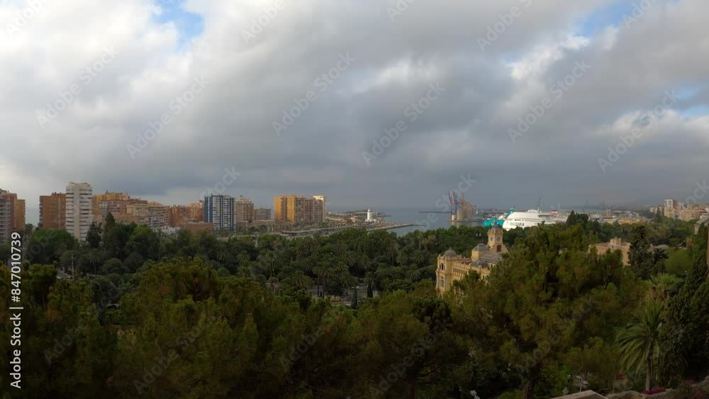 Panoramic aerial view of Malaga in a cloudy summer day in the morning in Malaga, Spain Panoramic aerial view of Malaga in a cloudy summer day in the morning in Malaga, Spain