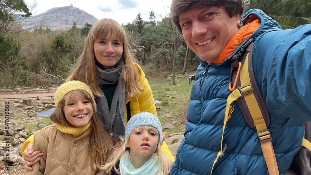 Selfie of a smiling family in forest Selfie of a smiling family in forest