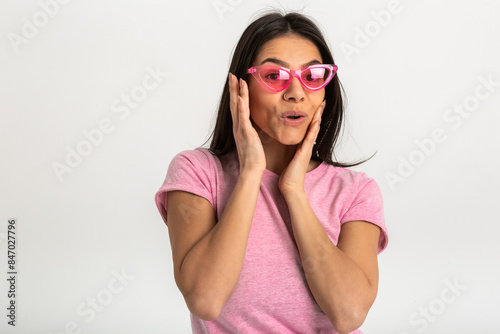attractive woman in pink t-shirt and sunglasses