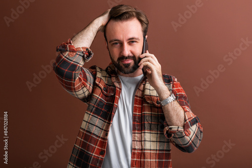 handsome man on brown background photo