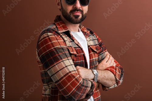 handsome man on brown background photo