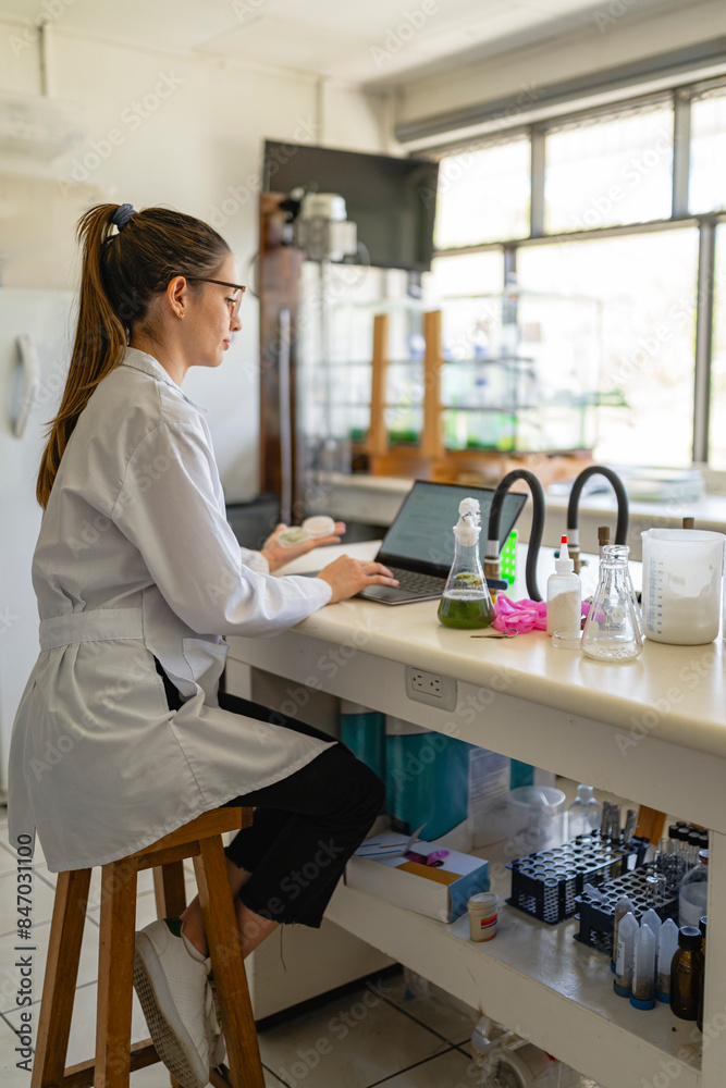Scientist woman in a laboratory. Scientist woman in a laboratory.