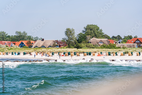 Fototapeta Naklejka Na Ścianę i Meble -  Crowded beach at the baltic sea on a summer day captured from pier