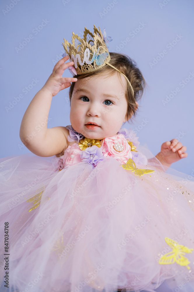 portrait of infant girl in birthday outfit portrait of infant girl in birthday outfit