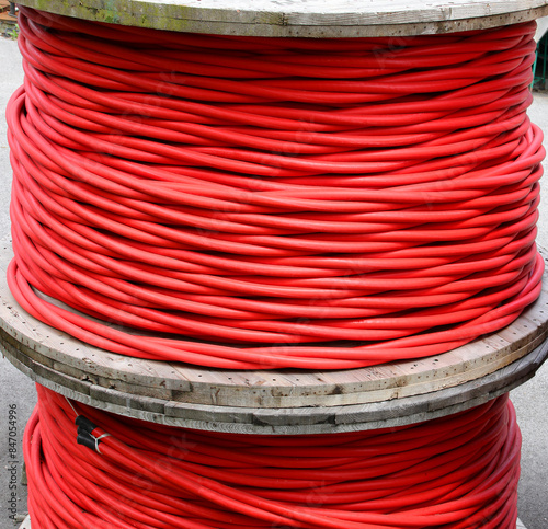 High-voltage red electrical cable in the warehouse of power company photo