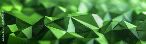 Abstract green low poly background of triangles.