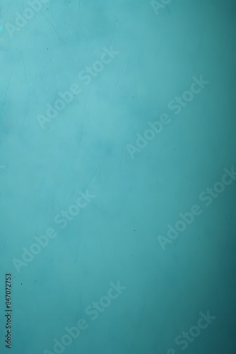 Solid teal background with no visible objects