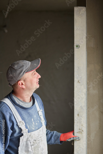 Wallpaper Mural Plastering of plaster workers on the walls for building. Torontodigital.ca