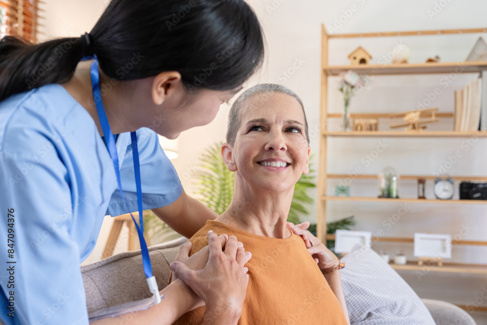 Caregiver Assisting Elderly Woman with Health and Well-being at Home, Smiling and Engaging in a Comfortable Living Room Setting Caregiver Assisting Elderly Woman with Health and Well-being at Home, Smiling and Engaging in a Comfortable Living Room Setting