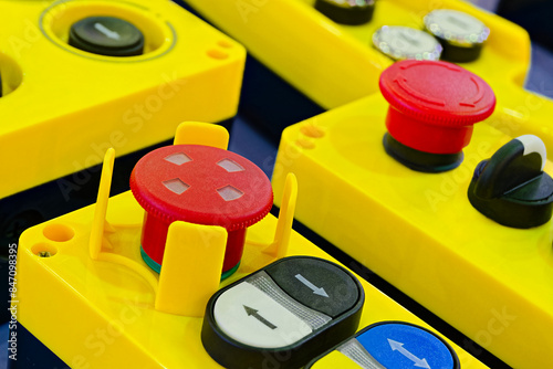 Assorted yellow plastic industrial remotes