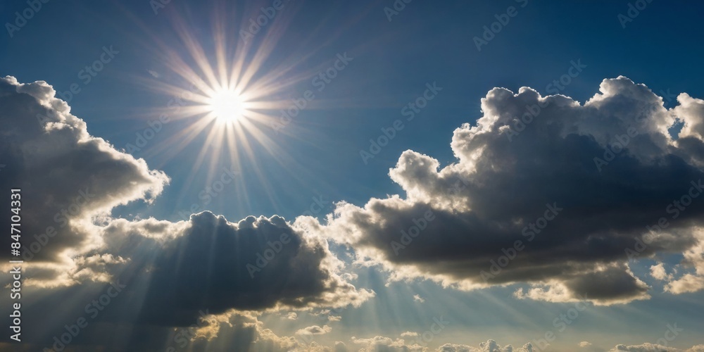 Tranquil scene with sunbeams piercing through fluffy clouds, showcasing the natural beauty of the sky