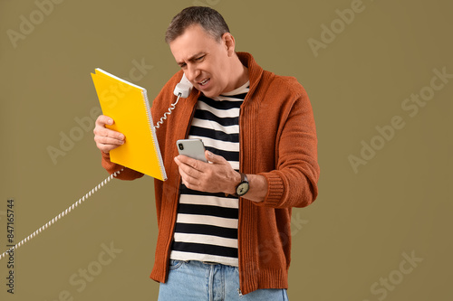 Stressed mature man with fo...