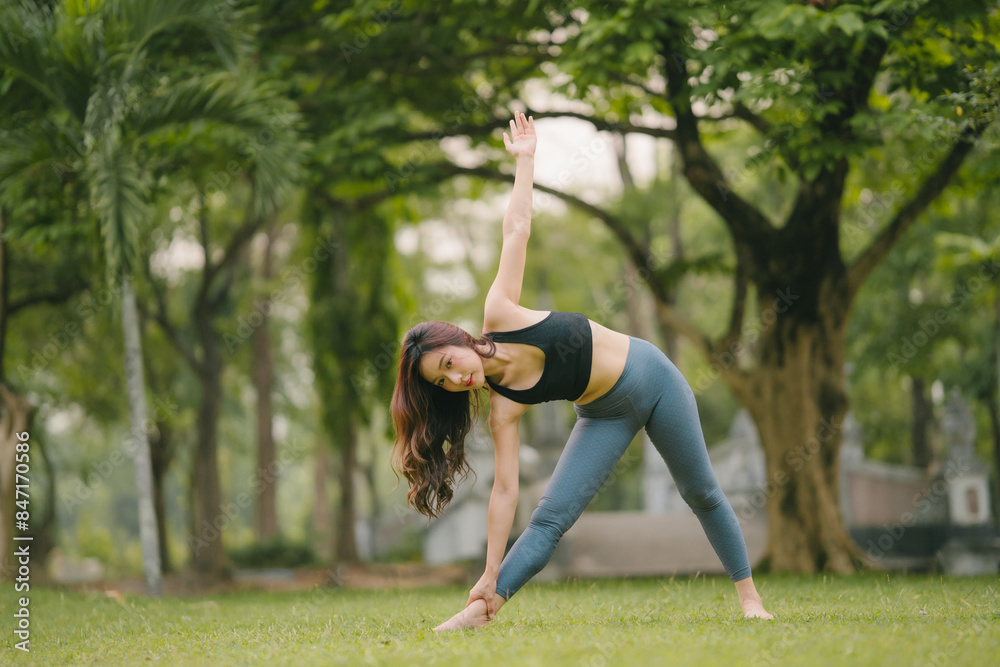 Fototapeta premium Portrait sport asian beauty body slim woman in sportswear sitting relax and girl practicing yoga and do fitness exercise in park at home.Diet