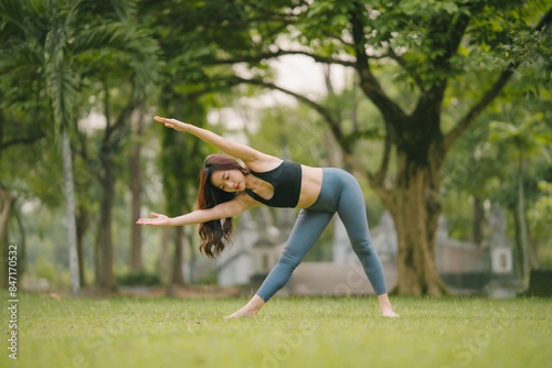 Portrait sport asian beauty body slim woman in sportswear sitting relax and girl practicing yoga and do fitness exercise in park at home.Diet