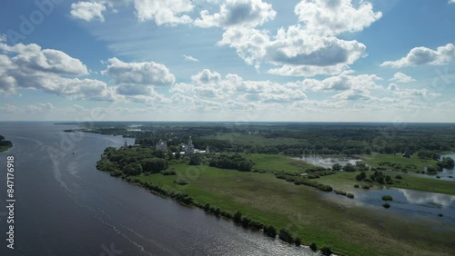 Panoramic aerial view of the Volkhov River and Lake Ilmen near Veliky Novgorod, natural attractions of Russia. Orthodox monastery on the river bank