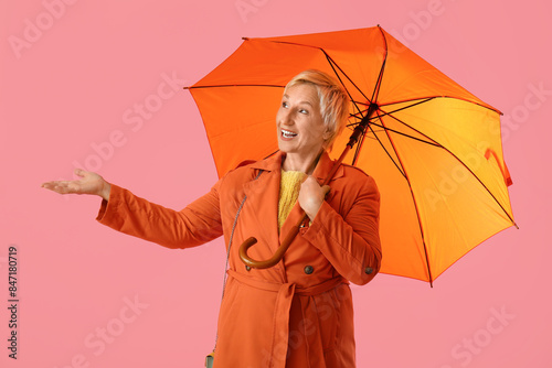 Beautiful mature woman with...