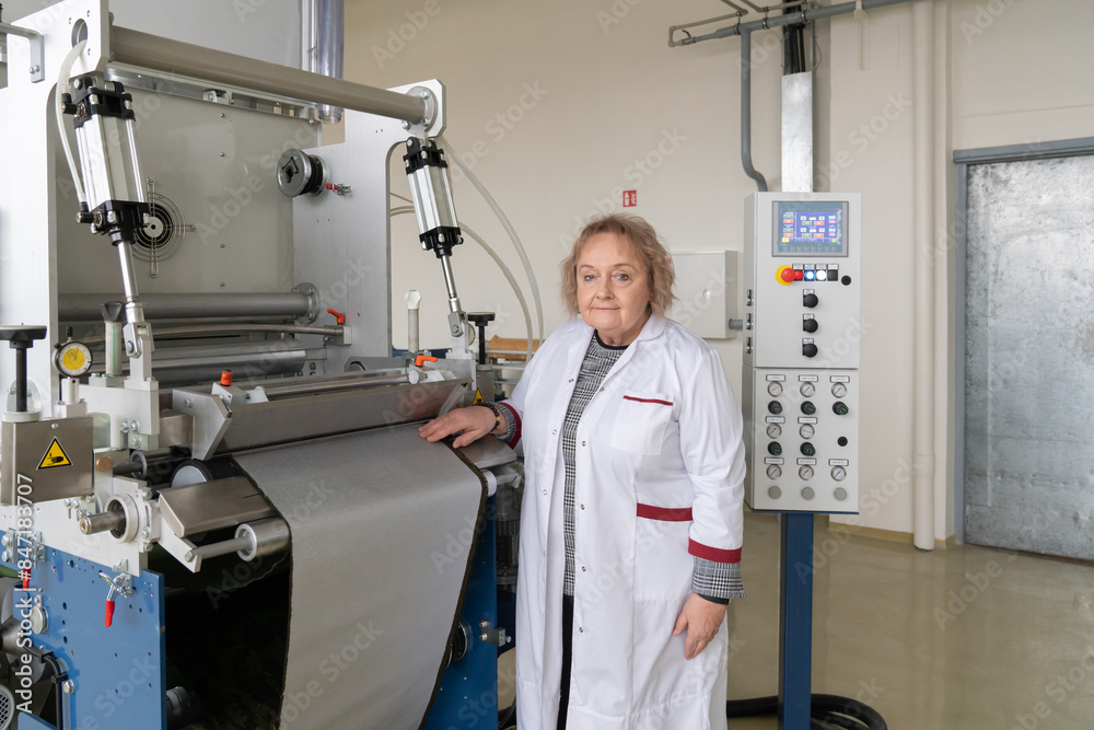 © Hernandez & Sorokina/Stocksy - Researcher Portrait In Textile Technology Lab