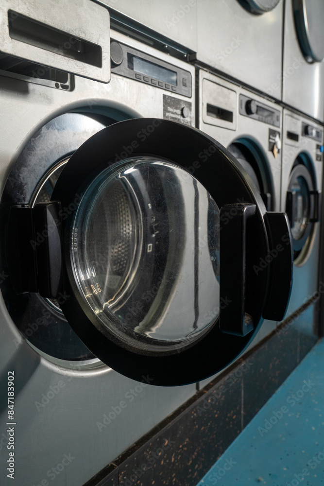 Row of industrial washing machines Row of industrial washing machines