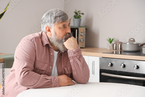 Portrait of sad senior man ...