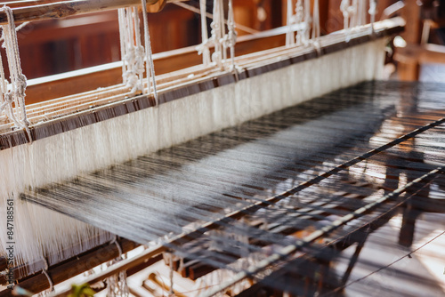 Warp Threads on a Wood Weaving Loom photo