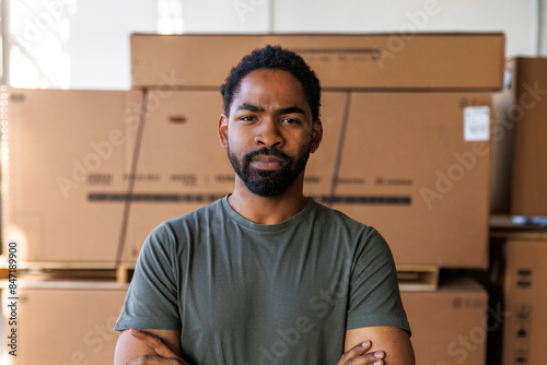 Confident male worker in warehouse photo