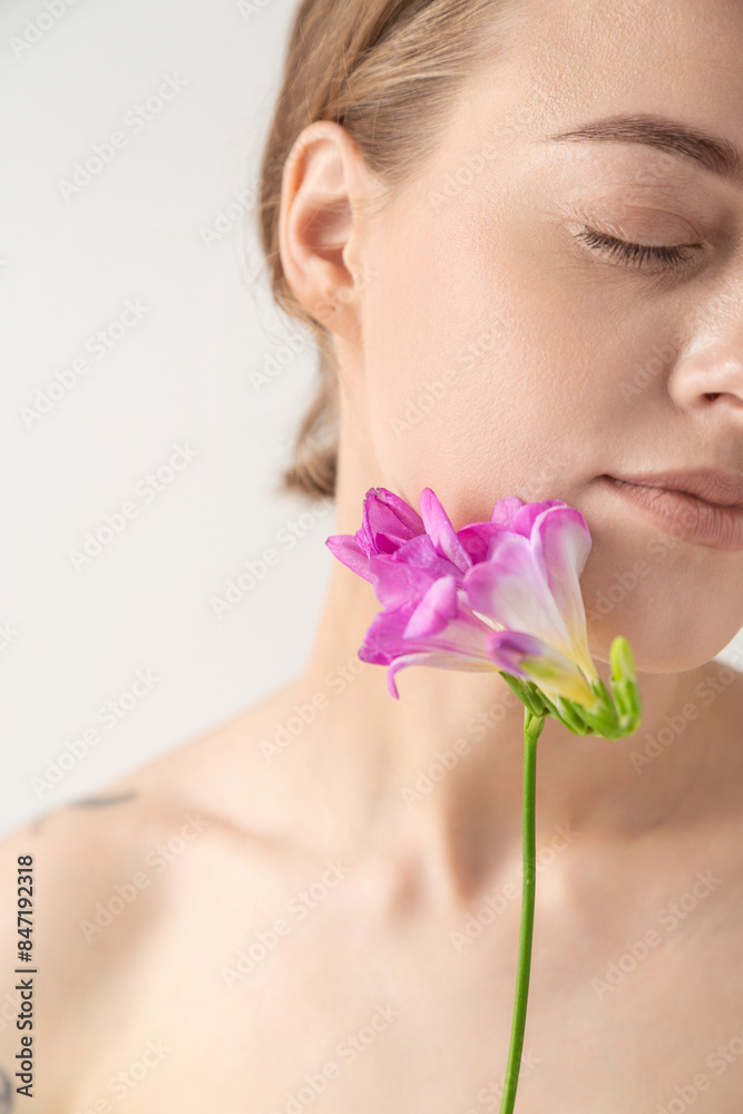 Skin Health Concept with Purple Flowers Skin Health Concept with Purple Flowers