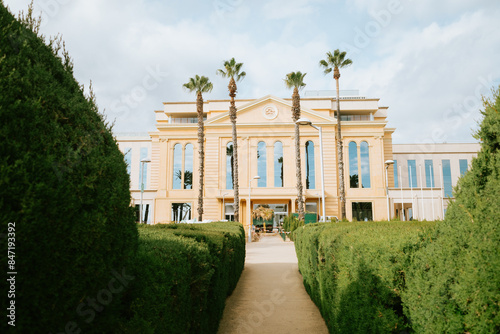 Elegant Hospital Building with Palms photo