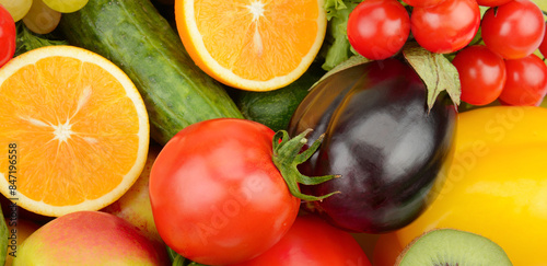 Fototapeta Naklejka Na Ścianę i Meble -  Assorted fresh ripe fruits and vegetables. Food background. Wide photo.