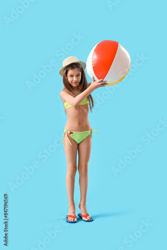 Cute little girl in swimsui...