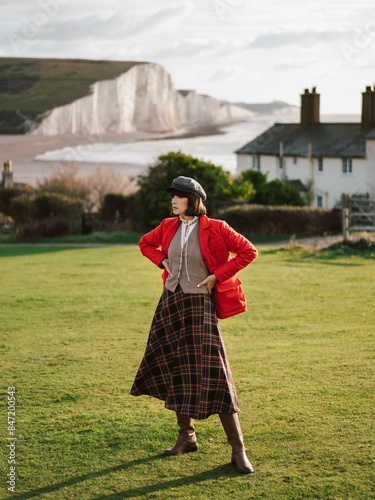 Woman standing in front of  beautiful landscapes