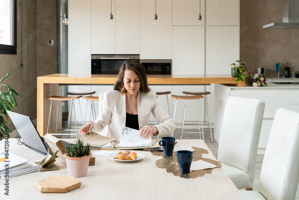 Wedding planner working in her office