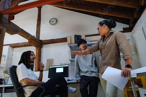 Group of coworkers in startup office photo