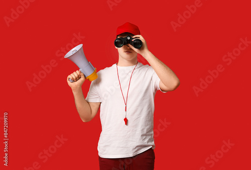 Male lifeguard with megapho...