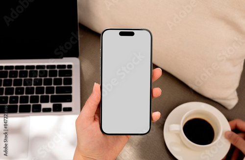 Business breakfast phone with white Screen with  Coffee and Laptop photo