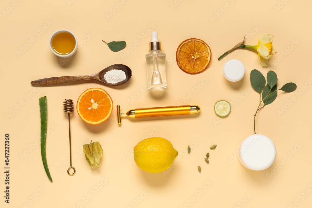 Face massage roller and natural ingredients for cosmetic mask on beige background Face massage roller and natural ingredients for cosmetic mask on beige background