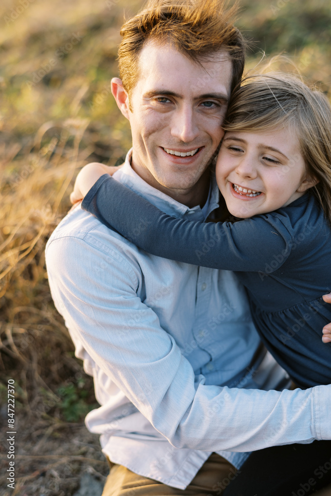 father and daughter hugging father and daughter hugging