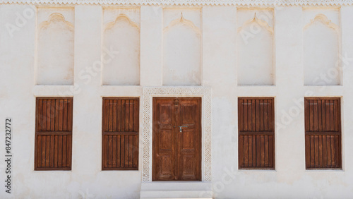 traditional qatari house exterior at the national qatar museum.