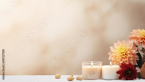 A beautiful arrangement of pink dahlias and various candles, creating a soft, romantic ambiance perfect for cozy and tranquil moments.

