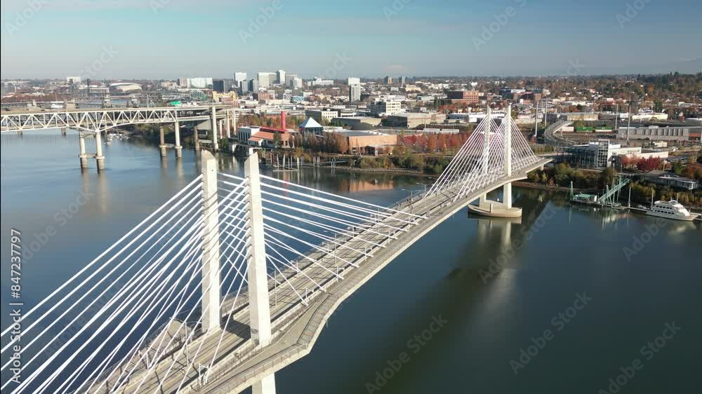 Drone footage of Tilikum Crossing Bridge spans the Willamette River in Portland, Oregon, USA