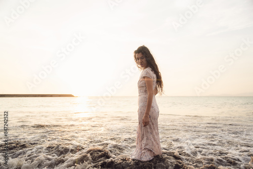 Serene Woman Enjoying Sunset at the Beach